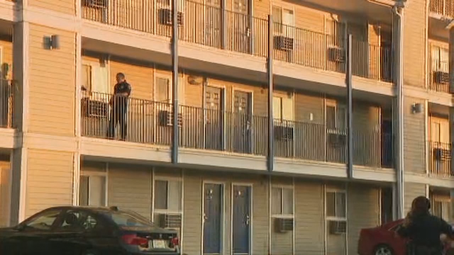 Police: Woman found shot next to young girl inside DeKalb County motel room