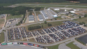 Atlanta Motor Speedway opens parking lot to store hundreds of Enterprise rental cars