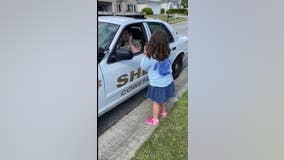 Coweta County deputy shares a sweet moment with his daughter through sign language