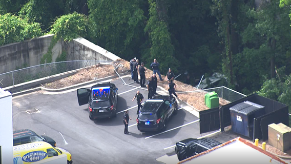 Police: Stolen car chase ends in crash through fence down 20-foot embankment