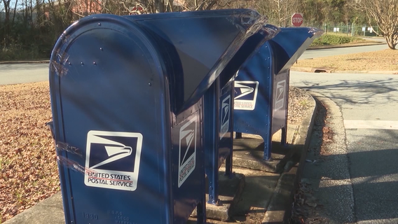 Detectives: 2 arrested for stealing checks from Roswell mailbox