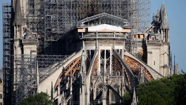 Year after Notre Dame fire, restoration stalled by coronavirus