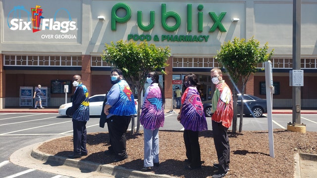 Six Flags Over Georgia honors Publix, Kroger employees on National Superhero Day