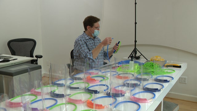 Atlanta industrial designer making face shields for health care workers
