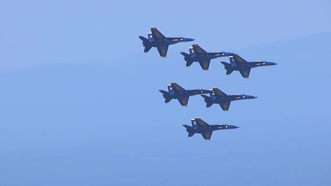 Blue Angels and Thunderbirds fly over Atlanta