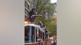 New York firefighter serenades medical workers with electric rendition of National Anthem