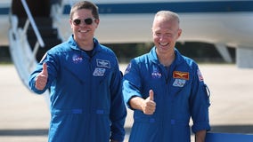 Astronauts arrive at Kennedy Space Center ahead of historic launch