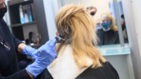 Hair salon owners face tough choice: should they stick with masks?