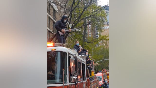 New York firefighter serenades medical workers with electric rendition of National Anthem