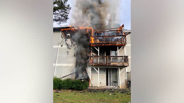 2 firefighters transported while battling DeKalb County apartment blaze