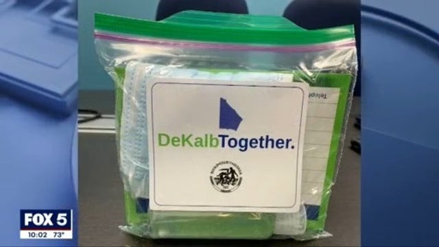 DeKalb County volunteers hand out masks every Saturday