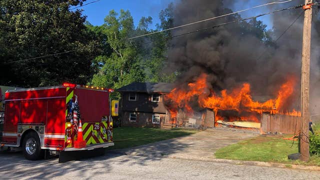 Firefighter suffers minor injuries after battling fires at neighboring homes in DeKalb County