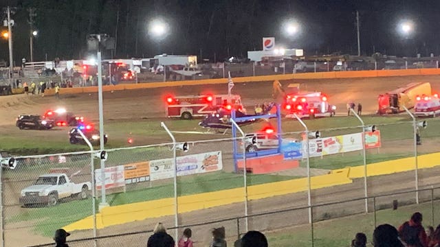 Man killed after school bus rolls onto him during races at Wisconsin speedway
