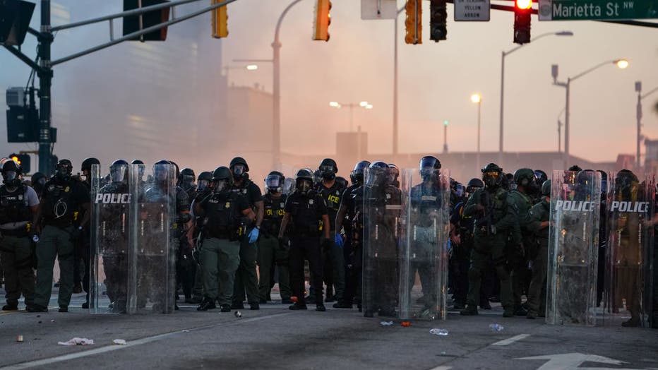 PHOTOS: Demonstrators Clash With Police On 2nd Night Of Atlanta Protests