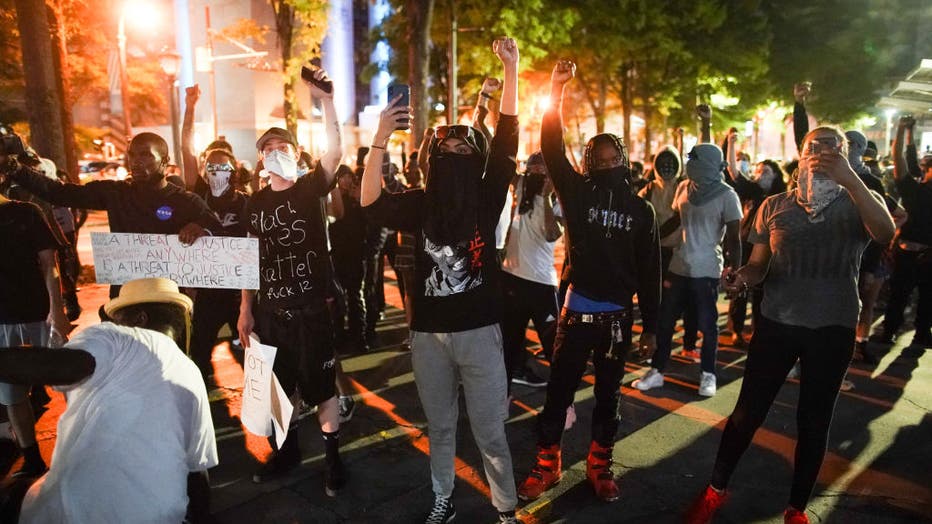 PHOTOS: Demonstrators Clash With Police On 2nd Night Of Atlanta Protests