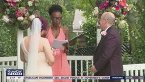 Couple ties the knot with socially distanced wedding