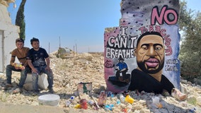 Syrian artists memorialize George Floyd with mural in war-torn city