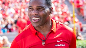 Herschel Walker offers to fly 'defund the police' supporters to countries without law enforcement