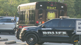 Police: Man arrested for discharging firearm behind Roswell home