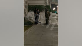 Man arrested for allegedly impersonating National Guard soldier; found with cache of weapons