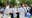 Emory health care workers kneel in a show of solidarity