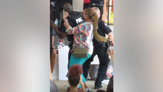 Carrollton police officers dance to 'Cupid Shuffle' with protesters