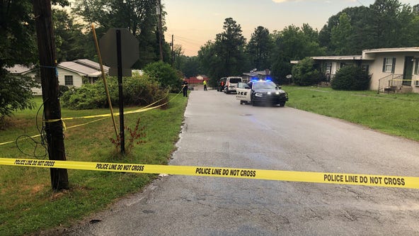 Officers: 2 bodies found inside burning car on Douglasville street