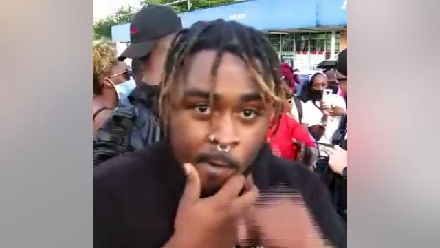 Fire investigators release photos of man wanted for questioning in Wendy's arson