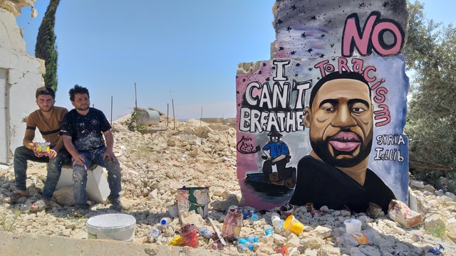 Syrian artists memorialize George Floyd with mural in war-torn city