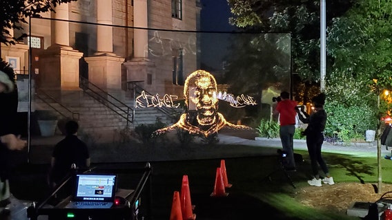 George Floyd hologram stops in Decatur Square