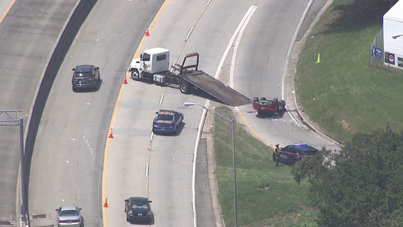 Police: 2 found shot inside overturned Jaguar along busy southwest Atlanta highway