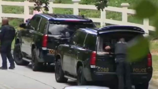 Police: 2 shot, including suspect during apparent armed robbery