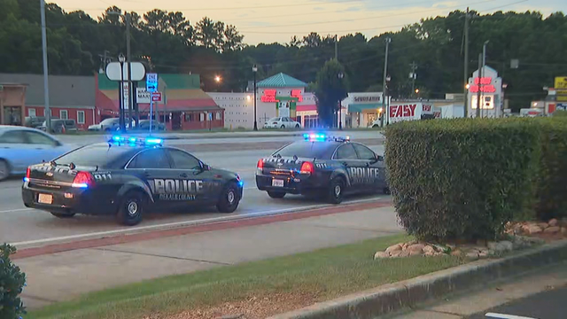 Police: 10-year-old girl, 2 men shot at DeKalb County hotel