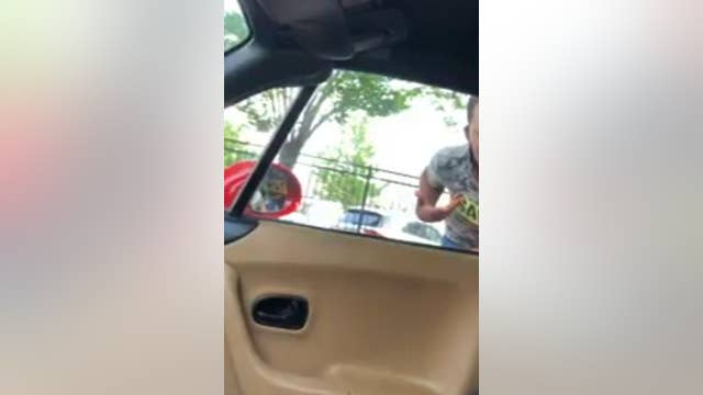 Man says teen selling water was aggressive, threw bottle at his car