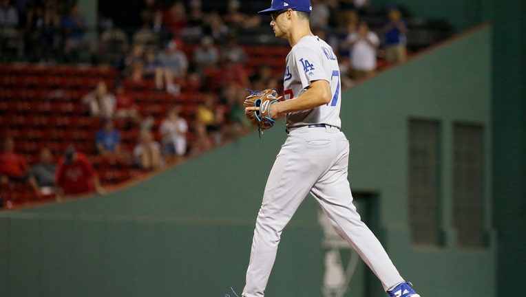 Los Angeles Dodgers relief pitcher Joe Kelly (17) take the mound during the twelfth inning of a baseball game against the Boston Red Sox on July 15, 2019 in Boston, Massachusetts