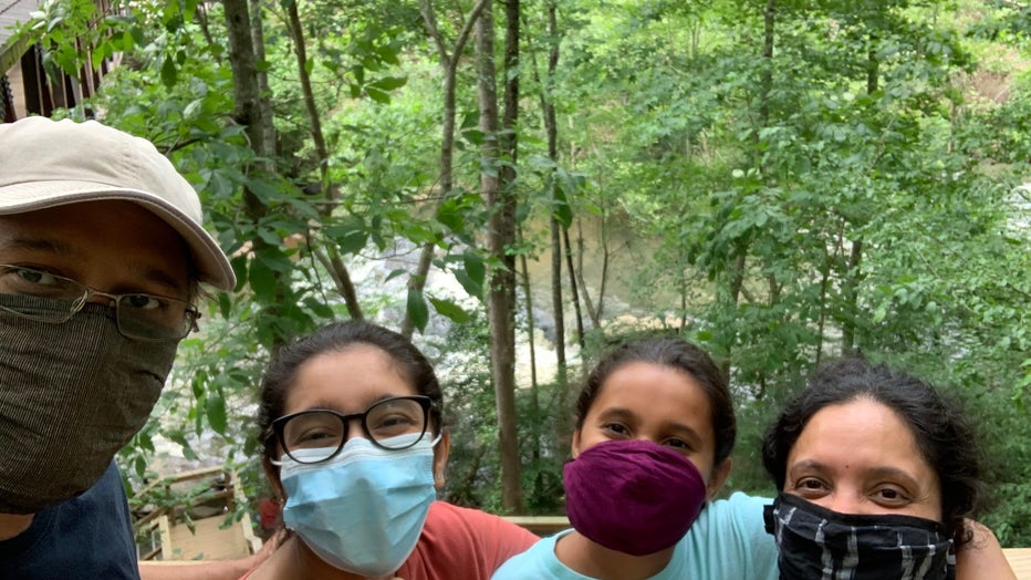 family wearing masks 