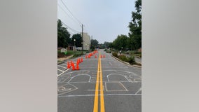 Hundreds of volunteers help paint 'Black Lives Matter' mural in Decatur roadway