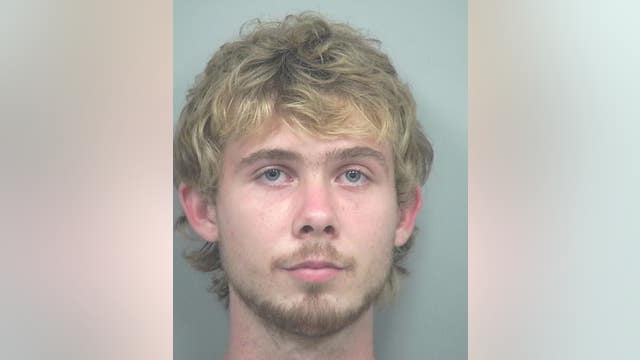 1 dead after shooting inside manufacturing business, suspect arrested