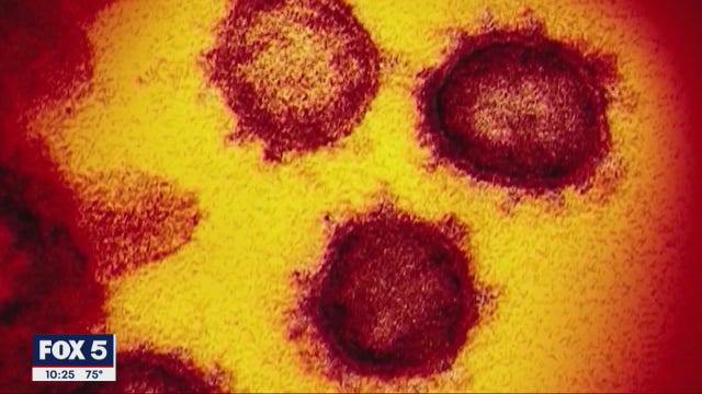 Returning Georgia college students greeted by face masks and fever checks