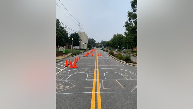 Hundreds of volunteers help paint 'Black Lives Matter' mural in Decatur roadway