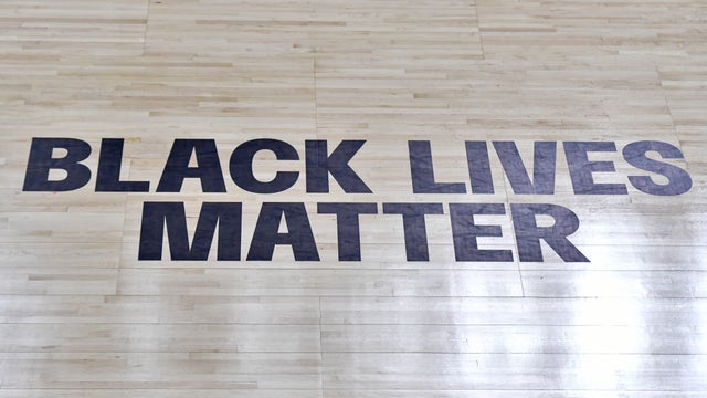 WNBA players wear 'Vote Warnock' T-shirts