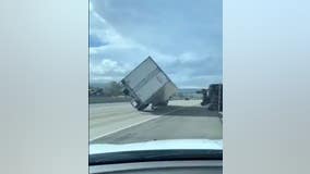 Hurricane-force winds topple dozens of semi-trucks in Utah