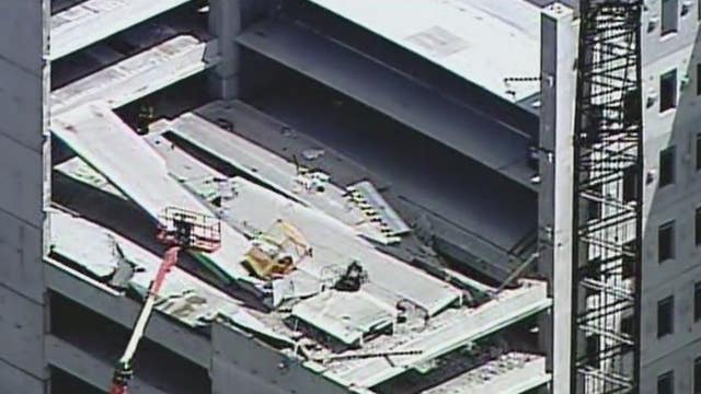 Firefighters rescue worker after partial collapse of midtown Atlanta parking garage