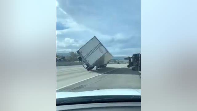 Hurricane-force winds topple dozens of semi-trucks in Utah