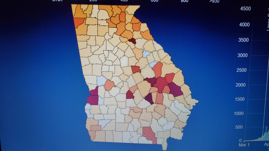 Map of the state of Georgia highlights a handful of counties with high coronavirus case averages.