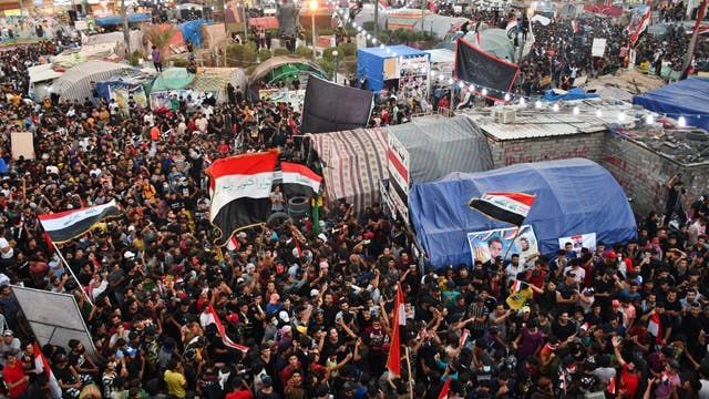 Tear gas fired as thousands mark 1 year of Iraq anti-government protests