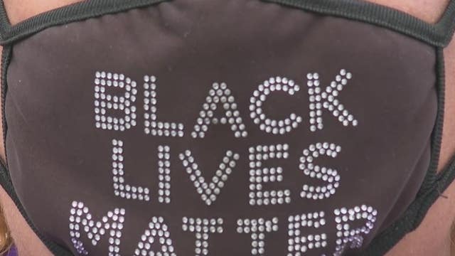 Voters claims entry was denied due to 'Black Lives Matter' face mask