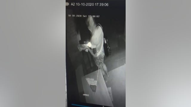 Woman attempts to light stranger’s porch on fire