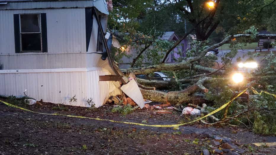 Man dies after tree falls on Cherokee County home