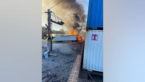No injuries in fiery crash involving tractor-trailer, train in Clayton County